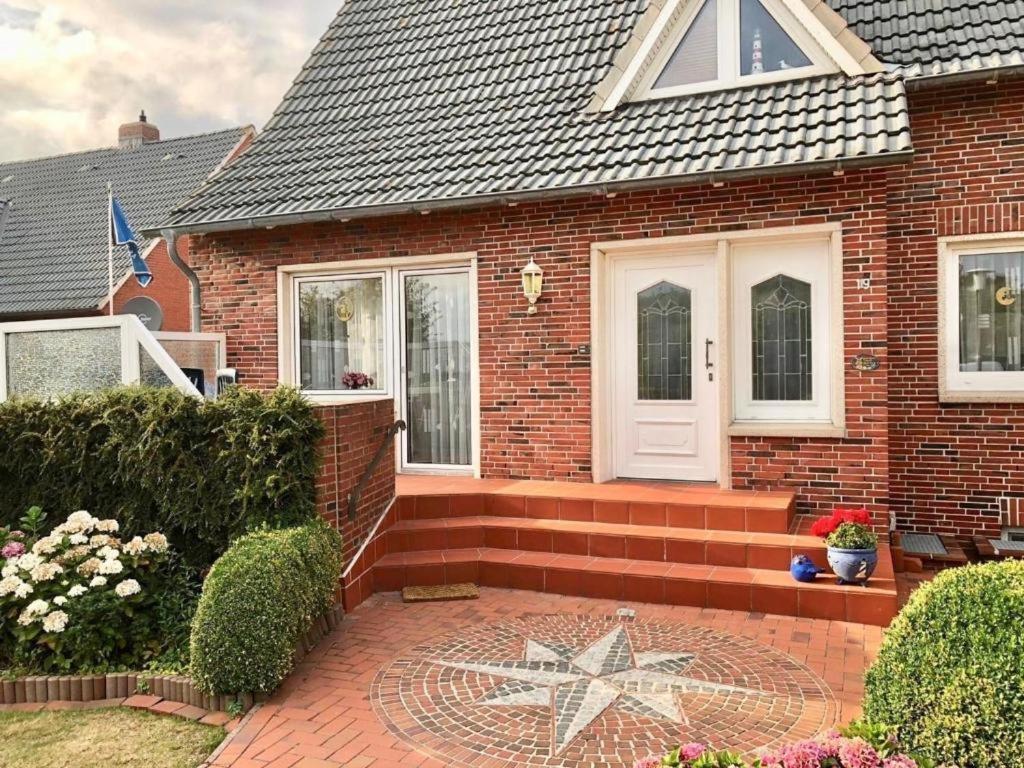 Haus Suedstrandliebe Whg Lona บอร์คุม ภายนอก รูปภาพ